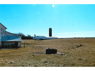 <b>HOUSE, ATTACHED GARAGE & 3+/- ACRES</b>
- <b>Size:</b>  3 Acres
- <b>Frontage:</b>  CR 1000 N         
- <b>Zoning:</b>  100-Ag            
- <b>Year Built:</b>  2012-2013
- <b>Style:</b>  1.5 Story Cape Cod
- <b>Size:</b>  2818 Sq. Ft.
- <b>Basement:</b>  1836 Sq. Ft.
- <b>Bedrooms:</b>  3
- <b>Baths:</b>  3.5       
- <b>Rooms:</b>  5
- <b>Fireplace:</b>  Yes
- <b>Front Porch:</b>  9'x42'
- <b>Back Porch:</b>  11'x42'
- <b>Electric:</b>  200 Amp
- <b>Phase:</b>  1st        
- <b>Air:</b>  Central
- <b>Heat:</b>  LP Gas
- <b>Siding:</b>  Cement Board
- <b>Roof:</b>  Asphalt
<br>       
- <b>Breezeway between house and garage</b>
- <b>Garage:</b>  30' x 36'
- <b>Bath:</b>  Full bath & shower
- <b>Kitchen:</b>  Summer
- <b>Siding:</b>  Cement Board
- <b>Roof:</b>  Asphalt

<b>11.929+/- ACRES, BUILDINGS & PASTURELAND</b>

There is an additional 11.929 acres around the home with tool shed, (2) grain bins, and (2) cattle sheds.  Property has a small creek and pasture land with some fencing.  Frontage on CR 1000 N & 600 W. - Cape Cod Rural Farm Home & Land