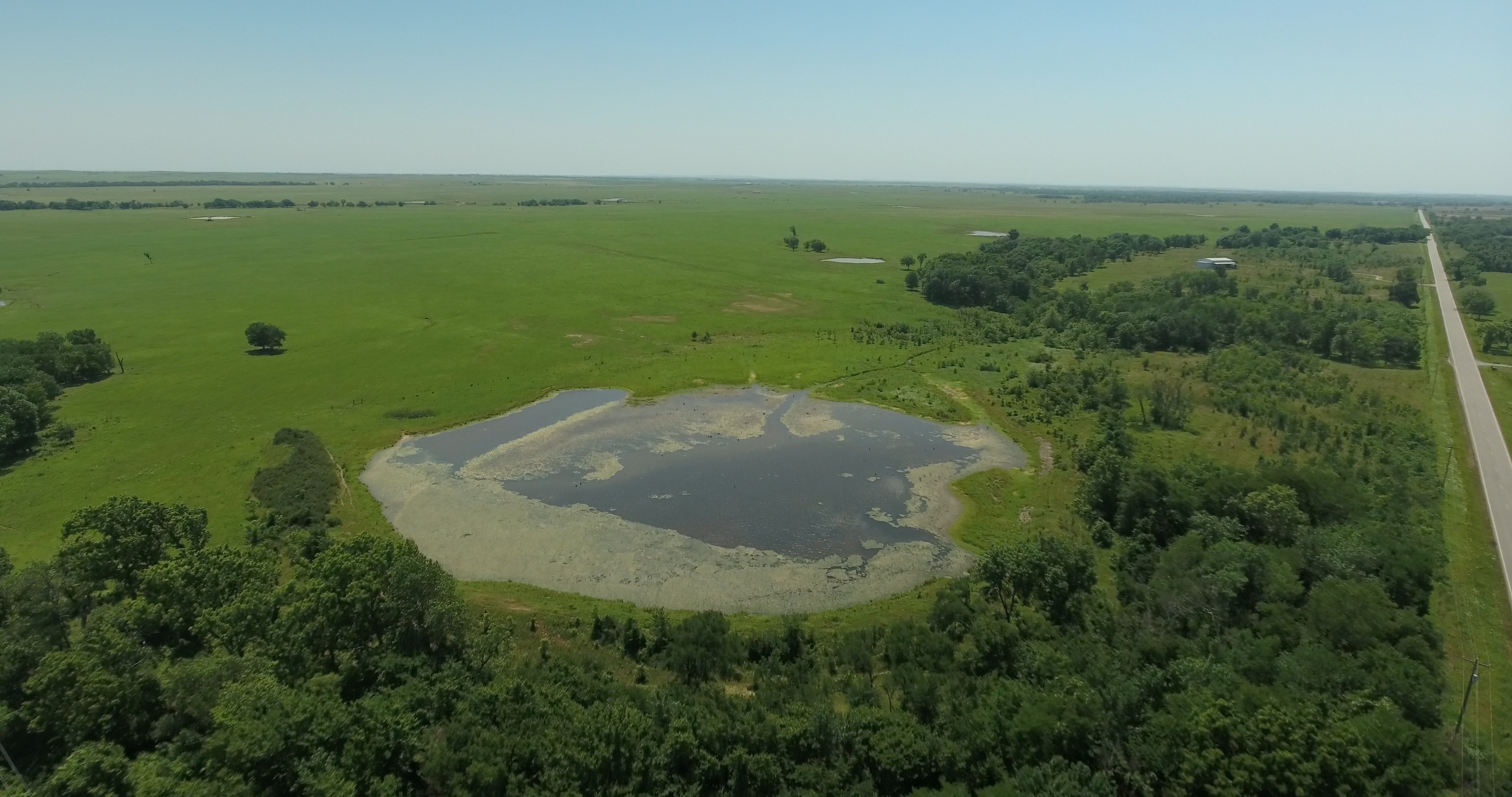 Property photo 1 - LAND AUCTION - 5,778+/-ACRES OFFERED IN 21 TRACTS IN OKMULGEE COUNTY, OKLAHOMA