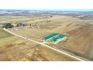 This 108+/- acre READY-TO-GO DAIRY FARM sits just 5.2 miles south of Lancaster, WI containing highly productive soils (Downs and Fayette). The farms modern, fully operational dairy has 200 sand bedded free stalls, 40 stall transition barn and 20 head bedding pack fresh pens. This is a fully functional dairy just waiting to go!<br>
The parlor is a VERY CLEAN Double 8 (expandable to 10) and includes GEA cow information along with TAS management program. There is a 2,500 gallon Mueller bulk tank. The office is fully equipped including bathroom and shower. Heat and electricity continue to be maintained.<br>
Additional buildings include loose housing cattle shed (40 head), Quonset machine shed and hay barn. The farm is equipped with a standby generator and two wells. There are two large earthen bunkers with cement floors and 7,000 bushel grain bin. The older farm house has a new septic system. Manure easement is available on bordering property with more land available to rent for adequate feed supply. - REAL ESTATE FOR SALE - 108+/- ACRES