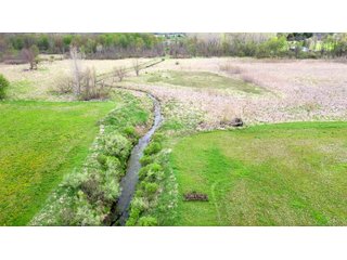 This property consists of approximately 40+/- acres and several beautiful potential building sites. The combination of woods, water, and grassland provide for a unique habitat attractive to many game species. This quiet area is prime hunting land for deer, turkey, and pheasant. Do not miss out on this unique recreational and development opportunity!  - Real Estate Listing - Property for Sale - 40+/- Acres