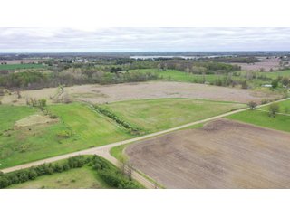 This property consists of approximately 40+/- acres and several beautiful potential building sites. The combination of woods, water, and grassland provide for a unique habitat attractive to many game species. This quiet area is prime hunting land for deer, turkey, and pheasant. Do not miss out on this unique recreational and development opportunity!  - Real Estate Listing - Property for Sale - 40+/- Acres