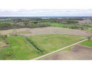 This property consists of approximately 40+/- acres and several beautiful potential building sites. The combination of woods, water, and grassland provide for a unique habitat attractive to many game species. This quiet area is prime hunting land for deer, turkey, and pheasant. Do not miss out on this unique recreational and development opportunity!  - Real Estate Listing - Property for Sale - 40+/- Acres