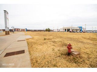 Outstanding corner parcel (195ft x 133ft) located in the largest growth sector of Stillwater, OK.  Surrounding businesses include: Walmart, Bill Knight Ford, 6th Ave Honda, IQ Car Wash, Spring Hill Suites by Marriott, Wilson Buick GMC and many more.  With an excellent location, easy accessibility, high visibility and in the natural growth path of Stillwater this lot is well suited for a variety of commercial uses.  Visit website for extensive property information, including ALTA survey, phase I study, restrictive covenants and title information.  - WEST STILLWATER COMMERCIAL LOT ON HIGHWAY 51