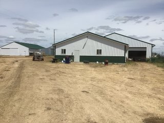<LI>House is three bedroom, two bath, built in 1970s recently updated. Large two car garage, possible to finish basement. Has pellet and oil furnace. Septic is up to date. Well is 60ft -100ft depth, need to confirm.
<li>	Farm is located 5+/- miles from Lancaster WI. 38+/- miles to Dubuque Iowa.
<li>	Farm is currently setup as a goat dairy, milking 350 to 400 head. Farm is located next to good feed supplies and has approximately 7+/- acres of pasture. 
<li>	Buildings have many uses as storage, horse arena, converted to dairy or milk goats as the milk plant is in Lancaster. - REAL ESTATE FOR SALE 36.16+/- ACRES 
