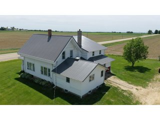 Two-story, farm house with porch, new roof and new parcel addition - New chimney - House is solid and in a good location, needs to be finished and updated on interior - House has four bedrooms and two bathrooms, pocket door and original old wood trim - House was rented at time of listing. - Taxes on parcel to be split $2028. Taxes amount are unknown until after split.
<li> Garage is unattached, 18ft x18ft with 10ft wide x 7ft height door, (new steel) <li>Quonset Machine shed, 34ft x70ft, (new steel) 14ft x11ft 6in door <li> Open - sided Machine shed, 46ft x150ft, 11ft 4in height <li> Horse barn, 26ft  x36ft concrete walls <li> Red storage shed, 18ft x30ft <li> Open Front Calf Barn, 8ft x90ft, with 13 pens. - REAL ESTATE PROPERTY FOR SALE 2.7+/-  ACRES IN GRANT COUNTY, WI