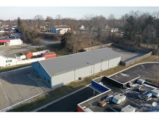 <b><font size=5 color=red>**PRICE REDUCED AGAIN!**</font></b><br><br>Now that the owners have moved to a new location this building is for sale and is a unique opportunity to purchase a large building and commercial lot in a great location right of SR 9 and within Albion. The lot is .710 acres and the property contains a 5,712 sq. ft. building that includes two large workshops as well as two office spaces and a restroom. The perimeter fence was installed around the back end of the lot in 2017. The building boasts excellent internet and phone service with Ligtel Fiber Optics installed in 2019. All new gutters and ice jams were installed in 2020. There is a 7.5 Horsepower air compressor with 3/4 Rapid Air lines on the east end of the building. The building contains dual furnaces, with the west half of the building being heated and cooled and east end being heat only. The building has been managed tremendously and has a wide variety of possible uses! Don't miss out on this unique chance to acquire a nice building with a great location!<li>Great frontage and visibility being located right off SR 9
<li>Hi Efficiency LED Lights Installed in 2020
<li>Extremely well-maintained building
<li>Ligtel Fiber Optics Installed in 2019
<li>Can be creative with uses, very adaptable building!<br>
<li>Water is with Albion City Utilities with an average cost of $30 per month
<li>Utilities NIPSCO (GAS) monthly fees $175 winter $50 summer (Approx)
<li>Electric AEP with costs ranging from $225 - 300 (Approx)
<li>Taxes $3,306.40 per year
<li>$10,000 available from the Town of Albion for front facade upgrading
<li>Possible entrance from back onto S. Liberty St. by applying for a driveway permit
<li>11 1/2ft ceilings
<li>10ft x 12ft overhead door in rear
<li>2- offices and 1 bathroom - REAL ESTATE FOR SALE - COMMERCIAL BUILDING - NOBLE COUNTY, IN **PRICE REDUCED**