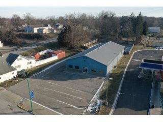 <b><font size=5 color=red>**PRICE REDUCED AGAIN!**</font></b><br><br>Now that the owners have moved to a new location this building is for sale and is a unique opportunity to purchase a large building and commercial lot in a great location right of SR 9 and within Albion. The lot is .710 acres and the property contains a 5,712 sq. ft. building that includes two large workshops as well as two office spaces and a restroom. The perimeter fence was installed around the back end of the lot in 2017. The building boasts excellent internet and phone service with Ligtel Fiber Optics installed in 2019. All new gutters and ice jams were installed in 2020. There is a 7.5 Horsepower air compressor with 3/4 Rapid Air lines on the east end of the building. The building contains dual furnaces, with the west half of the building being heated and cooled and east end being heat only. The building has been managed tremendously and has a wide variety of possible uses! Don't miss out on this unique chance to acquire a nice building with a great location!<li>Great frontage and visibility being located right off SR 9
<li>Hi Efficiency LED Lights Installed in 2020
<li>Extremely well-maintained building
<li>Ligtel Fiber Optics Installed in 2019
<li>Can be creative with uses, very adaptable building!<br>
<li>Water is with Albion City Utilities with an average cost of $30 per month
<li>Utilities NIPSCO (GAS) monthly fees $175 winter $50 summer (Approx)
<li>Electric AEP with costs ranging from $225 - 300 (Approx)
<li>Taxes $3,306.40 per year
<li>$10,000 available from the Town of Albion for front facade upgrading
<li>Possible entrance from back onto S. Liberty St. by applying for a driveway permit
<li>11 1/2ft ceilings
<li>10ft x 12ft overhead door in rear
<li>2- offices and 1 bathroom - REAL ESTATE FOR SALE - COMMERCIAL BUILDING - NOBLE COUNTY, IN **PRICE REDUCED**