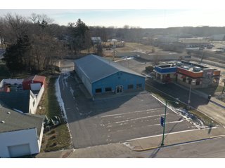 <b><font size=5 color=red>**PRICE REDUCED AGAIN!**</font></b><br><br>Now that the owners have moved to a new location this building is for sale and is a unique opportunity to purchase a large building and commercial lot in a great location right of SR 9 and within Albion. The lot is .710 acres and the property contains a 5,712 sq. ft. building that includes two large workshops as well as two office spaces and a restroom. The perimeter fence was installed around the back end of the lot in 2017. The building boasts excellent internet and phone service with Ligtel Fiber Optics installed in 2019. All new gutters and ice jams were installed in 2020. There is a 7.5 Horsepower air compressor with 3/4 Rapid Air lines on the east end of the building. The building contains dual furnaces, with the west half of the building being heated and cooled and east end being heat only. The building has been managed tremendously and has a wide variety of possible uses! Don't miss out on this unique chance to acquire a nice building with a great location!<li>Great frontage and visibility being located right off SR 9
<li>Hi Efficiency LED Lights Installed in 2020
<li>Extremely well-maintained building
<li>Ligtel Fiber Optics Installed in 2019
<li>Can be creative with uses, very adaptable building!<br>
<li>Water is with Albion City Utilities with an average cost of $30 per month
<li>Utilities NIPSCO (GAS) monthly fees $175 winter $50 summer (Approx)
<li>Electric AEP with costs ranging from $225 - 300 (Approx)
<li>Taxes $3,306.40 per year
<li>$10,000 available from the Town of Albion for front facade upgrading
<li>Possible entrance from back onto S. Liberty St. by applying for a driveway permit
<li>11 1/2ft ceilings
<li>10ft x 12ft overhead door in rear
<li>2- offices and 1 bathroom - REAL ESTATE FOR SALE - COMMERCIAL BUILDING - NOBLE COUNTY, IN **PRICE REDUCED**