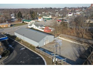 <b><font size=5 color=red>**PRICE REDUCED AGAIN!**</font></b><br><br>Now that the owners have moved to a new location this building is for sale and is a unique opportunity to purchase a large building and commercial lot in a great location right of SR 9 and within Albion. The lot is .710 acres and the property contains a 5,712 sq. ft. building that includes two large workshops as well as two office spaces and a restroom. The perimeter fence was installed around the back end of the lot in 2017. The building boasts excellent internet and phone service with Ligtel Fiber Optics installed in 2019. All new gutters and ice jams were installed in 2020. There is a 7.5 Horsepower air compressor with 3/4 Rapid Air lines on the east end of the building. The building contains dual furnaces, with the west half of the building being heated and cooled and east end being heat only. The building has been managed tremendously and has a wide variety of possible uses! Don't miss out on this unique chance to acquire a nice building with a great location!<li>Great frontage and visibility being located right off SR 9
<li>Hi Efficiency LED Lights Installed in 2020
<li>Extremely well-maintained building
<li>Ligtel Fiber Optics Installed in 2019
<li>Can be creative with uses, very adaptable building!<br>
<li>Water is with Albion City Utilities with an average cost of $30 per month
<li>Utilities NIPSCO (GAS) monthly fees $175 winter $50 summer (Approx)
<li>Electric AEP with costs ranging from $225 - 300 (Approx)
<li>Taxes $3,306.40 per year
<li>$10,000 available from the Town of Albion for front facade upgrading
<li>Possible entrance from back onto S. Liberty St. by applying for a driveway permit
<li>11 1/2ft ceilings
<li>10ft x 12ft overhead door in rear
<li>2- offices and 1 bathroom - REAL ESTATE FOR SALE - COMMERCIAL BUILDING - NOBLE COUNTY, IN **PRICE REDUCED**