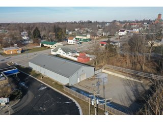<b><font size=5 color=red>**PRICE REDUCED AGAIN!**</font></b><br><br>Now that the owners have moved to a new location this building is for sale and is a unique opportunity to purchase a large building and commercial lot in a great location right of SR 9 and within Albion. The lot is .710 acres and the property contains a 5,712 sq. ft. building that includes two large workshops as well as two office spaces and a restroom. The perimeter fence was installed around the back end of the lot in 2017. The building boasts excellent internet and phone service with Ligtel Fiber Optics installed in 2019. All new gutters and ice jams were installed in 2020. There is a 7.5 Horsepower air compressor with 3/4 Rapid Air lines on the east end of the building. The building contains dual furnaces, with the west half of the building being heated and cooled and east end being heat only. The building has been managed tremendously and has a wide variety of possible uses! Don't miss out on this unique chance to acquire a nice building with a great location!<li>Great frontage and visibility being located right off SR 9
<li>Hi Efficiency LED Lights Installed in 2020
<li>Extremely well-maintained building
<li>Ligtel Fiber Optics Installed in 2019
<li>Can be creative with uses, very adaptable building!<br>
<li>Water is with Albion City Utilities with an average cost of $30 per month
<li>Utilities NIPSCO (GAS) monthly fees $175 winter $50 summer (Approx)
<li>Electric AEP with costs ranging from $225 - 300 (Approx)
<li>Taxes $3,306.40 per year
<li>$10,000 available from the Town of Albion for front facade upgrading
<li>Possible entrance from back onto S. Liberty St. by applying for a driveway permit
<li>11 1/2ft ceilings
<li>10ft x 12ft overhead door in rear
<li>2- offices and 1 bathroom - REAL ESTATE FOR SALE - COMMERCIAL BUILDING - NOBLE COUNTY, IN **PRICE REDUCED**
