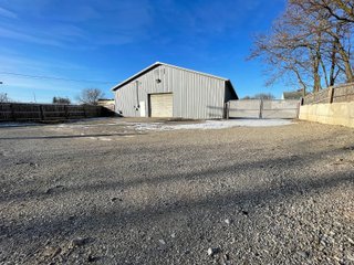 <b><font size=5 color=red>**PRICE REDUCED AGAIN!**</font></b><br><br>Now that the owners have moved to a new location this building is for sale and is a unique opportunity to purchase a large building and commercial lot in a great location right of SR 9 and within Albion. The lot is .710 acres and the property contains a 5,712 sq. ft. building that includes two large workshops as well as two office spaces and a restroom. The perimeter fence was installed around the back end of the lot in 2017. The building boasts excellent internet and phone service with Ligtel Fiber Optics installed in 2019. All new gutters and ice jams were installed in 2020. There is a 7.5 Horsepower air compressor with 3/4 Rapid Air lines on the east end of the building. The building contains dual furnaces, with the west half of the building being heated and cooled and east end being heat only. The building has been managed tremendously and has a wide variety of possible uses! Don't miss out on this unique chance to acquire a nice building with a great location!<li>Great frontage and visibility being located right off SR 9
<li>Hi Efficiency LED Lights Installed in 2020
<li>Extremely well-maintained building
<li>Ligtel Fiber Optics Installed in 2019
<li>Can be creative with uses, very adaptable building!<br>
<li>Water is with Albion City Utilities with an average cost of $30 per month
<li>Utilities NIPSCO (GAS) monthly fees $175 winter $50 summer (Approx)
<li>Electric AEP with costs ranging from $225 - 300 (Approx)
<li>Taxes $3,306.40 per year
<li>$10,000 available from the Town of Albion for front facade upgrading
<li>Possible entrance from back onto S. Liberty St. by applying for a driveway permit
<li>11 1/2ft ceilings
<li>10ft x 12ft overhead door in rear
<li>2- offices and 1 bathroom - REAL ESTATE FOR SALE - COMMERCIAL BUILDING - NOBLE COUNTY, IN **PRICE REDUCED**