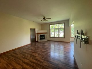 The former Sherman home is laid out for very comfortable living with an open style floor plan. The main living area contains numerous windows allowing for great natural light, and great visibility to the backyard of flowers and many varieties of trees such as Pear, Plum, and Cherry. The home also contains a gas fireplace with 3 bedrooms, 2 full baths, sun porch, garden shed, and a 733 sq. ft. 3 car garage. The home has central air and heat, a gas range, and a hot water heater. The refrigerator, washer, and dryer go with the home.  The septic has been pumped every 2 years, and the property has a 4in. well. All doors are wheelchair accessible and there is additional attic storage above the garage.  - RANCH STYLE HOME FOR SALE