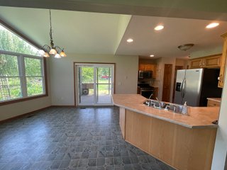 The former Sherman home is laid out for very comfortable living with an open style floor plan. The main living area contains numerous windows allowing for great natural light, and great visibility to the backyard of flowers and many varieties of trees such as Pear, Plum, and Cherry. The home also contains a gas fireplace with 3 bedrooms, 2 full baths, sun porch, garden shed, and a 733 sq. ft. 3 car garage. The home has central air and heat, a gas range, and a hot water heater. The refrigerator, washer, and dryer go with the home.  The septic has been pumped every 2 years, and the property has a 4in. well. All doors are wheelchair accessible and there is additional attic storage above the garage.  - RANCH STYLE HOME FOR SALE