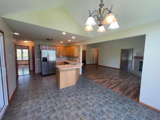 The former Sherman home is laid out for very comfortable living with an open style floor plan. The main living area contains numerous windows allowing for great natural light, and great visibility to the backyard of flowers and many varieties of trees such as Pear, Plum, and Cherry. The home also contains a gas fireplace with 3 bedrooms, 2 full baths, sun porch, garden shed, and a 733 sq. ft. 3 car garage. The home has central air and heat, a gas range, and a hot water heater. The refrigerator, washer, and dryer go with the home.  The septic has been pumped every 2 years, and the property has a 4in. well. All doors are wheelchair accessible and there is additional attic storage above the garage.  - RANCH STYLE HOME FOR SALE