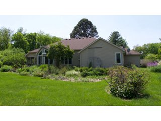 The former Sherman home is laid out for very comfortable living with an open style floor plan. The main living area contains numerous windows allowing for great natural light, and great visibility to the backyard of flowers and many varieties of trees such as Pear, Plum, and Cherry. The home also contains a gas fireplace with 3 bedrooms, 2 full baths, sun porch, garden shed, and a 733 sq. ft. 3 car garage. The home has central air and heat, a gas range, and a hot water heater. The refrigerator, washer, and dryer go with the home.  The septic has been pumped every 2 years, and the property has a 4in. well. All doors are wheelchair accessible and there is additional attic storage above the garage.  - RANCH STYLE HOME FOR SALE