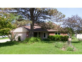 The former Sherman home is laid out for very comfortable living with an open style floor plan. The main living area contains numerous windows allowing for great natural light, and great visibility to the backyard of flowers and many varieties of trees such as Pear, Plum, and Cherry. The home also contains a gas fireplace with 3 bedrooms, 2 full baths, sun porch, garden shed, and a 733 sq. ft. 3 car garage. The home has central air and heat, a gas range, and a hot water heater. The refrigerator, washer, and dryer go with the home.  The septic has been pumped every 2 years, and the property has a 4in. well. All doors are wheelchair accessible and there is additional attic storage above the garage.  - RANCH STYLE HOME FOR SALE
