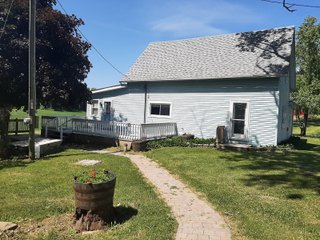 1 1/2 Story Country home, on 1.84+/- acres, 2155+/- square feet of living space: living room, 4 bedrooms, 1 bath, eat in kitchen with appliances, large mud room, and laundry. The home has a newer furnace, water softener, water heater, a new roof in 2019, replacement windows, and a large wood deck. Detached two car garage with plenty of work space and a 36ft x40ft pole building.
 - HOME FOR SALE 1.84+/- ACRES IN WHITLEY COUNTY, IN