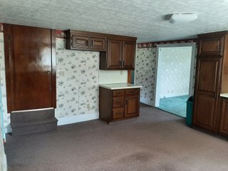 1 1/2 Story Country home, on 1.84+/- acres, 2155+/- square feet of living space: living room, 4 bedrooms, 1 bath, eat in kitchen with appliances, large mud room, and laundry. The home has a newer furnace, water softener, water heater, a new roof in 2019, replacement windows, and a large wood deck. Detached two car garage with plenty of work space and a 36ft x40ft pole building.
 - HOME FOR SALE 1.84+/- ACRES IN WHITLEY COUNTY, IN