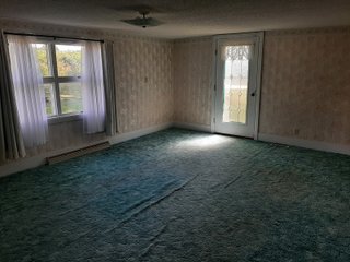 1 1/2 Story Country home, on 1.84+/- acres, 2155+/- square feet of living space: living room, 4 bedrooms, 1 bath, eat in kitchen with appliances, large mud room, and laundry. The home has a newer furnace, water softener, water heater, a new roof in 2019, replacement windows, and a large wood deck. Detached two car garage with plenty of work space and a 36ft x40ft pole building.
 - HOME FOR SALE 1.84+/- ACRES IN WHITLEY COUNTY, IN