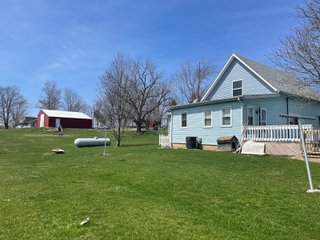 1 1/2 Story Country home, on 1.84+/- acres, 2155+/- square feet of living space: living room, 4 bedrooms, 1 bath, eat in kitchen with appliances, large mud room, and laundry. The home has a newer furnace, water softener, water heater, a new roof in 2019, replacement windows, and a large wood deck. Detached two car garage with plenty of work space and a 36ft x40ft pole building.
 - HOME FOR SALE 1.84+/- ACRES IN WHITLEY COUNTY, IN