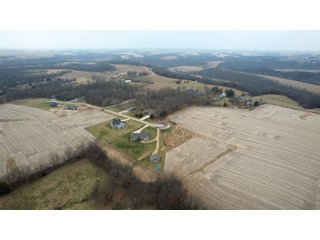  Just outside of Platteville at the end of a quiet cul-de-sac you will find this 1.42+/- deeded acre lot waiting for that perfect home. The lot sits on Hidden Lane which perfectly describes the location of this isolated neighborhood while at the same time giving the feel of country living. The location offers quick and easy access to Highway 151 making traveling to Platteville, Dubuque or Madison a cinch. - LOT FOR SALE 1.42+/- ACRES IN PLATTEVILLE, WISCONSIN