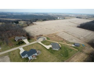  Just outside of Platteville at the end of a quiet cul-de-sac you will find this 1.42+/- deeded acre lot waiting for that perfect home. The lot sits on Hidden Lane which perfectly describes the location of this isolated neighborhood while at the same time giving the feel of country living. The location offers quick and easy access to Highway 151 making traveling to Platteville, Dubuque or Madison a cinch. - LOT FOR SALE 1.42+/- ACRES IN PLATTEVILLE, WISCONSIN