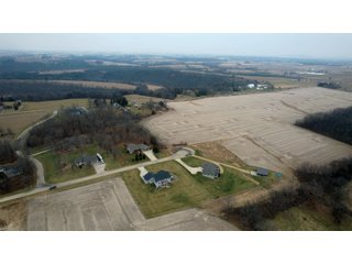 Just outside of Platteville at the end of a quiet cul-de-sac you will find this 1.26+/- deeded acre lot waiting for that perfect home. The lot sits on Hidden Lane which perfectly describes the location of this isolated neighborhood while at the same time giving the feel of country living. The location offers quick and easy access to highway 151 making traveling to Platteville, Dubuque or Madison a cinch. - LOT FOR SALE 1.26 +/- ACRES IN PLATTEVILLE, WISCONSIN