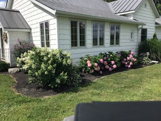 Don't miss this opportunity to experience country living at it's finest! This is a 3-bedroom, 2-bath, 1,876 square foot Country Home that has been completely updated and is ready to enjoy. The updates include a new addition, new roof, siding, wood flooring, air conditioner, heating system, electrical - you name it and it has been updated. Enjoy the beautiful landscaping and wide-open spaces that include mature trees, new plantings and even an apple orchard. House features include a 15x17 family room, 11x15 formal dining room, large bedrooms, parlor, sun room, large deck, laundry room, basement, whole-house generator and more. Outdoors you will find a spacious barn with room for tools, lawn equipment and even animals. There is also approximately 4 1/2 +/- acres for added income potential. This is a wonderful opportunity to create your dream home in the country. Up to 68+/- additional acres available with full frontage on the Mississinewa River. - BEAUTIFUL COUNTRY HOME FOR SALE - 13+/- ACRES IN DELAWARE COUNTY, INDIANA