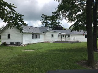 Don't miss this opportunity to experience country living at it's finest! This is a 3-bedroom, 2-bath, 1,876 square foot Country Home that has been completely updated and is ready to enjoy. The updates include a new addition, new roof, siding, wood flooring, air conditioner, heating system, electrical - you name it and it has been updated. Enjoy the beautiful landscaping and wide-open spaces that include mature trees, new plantings and even an apple orchard. House features include a 15x17 family room, 11x15 formal dining room, large bedrooms, parlor, sun room, large deck, laundry room, basement, whole-house generator and more. Outdoors you will find a spacious barn with room for tools, lawn equipment and even animals. There is also approximately 4 1/2 +/- acres for added income potential. This is a wonderful opportunity to create your dream home in the country. Up to 68+/- additional acres available with full frontage on the Mississinewa River. - BEAUTIFUL COUNTRY HOME FOR SALE - 13+/- ACRES IN DELAWARE COUNTY, INDIANA