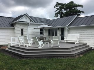 Don't miss this opportunity to experience country living at it's finest! This is a 3-bedroom, 2-bath, 1,876 square foot Country Home that has been completely updated and is ready to enjoy. The updates include a new addition, new roof, siding, wood flooring, air conditioner, heating system, electrical - you name it and it has been updated. Enjoy the beautiful landscaping and wide-open spaces that include mature trees, new plantings and even an apple orchard. House features include a 15x17 family room, 11x15 formal dining room, large bedrooms, parlor, sun room, large deck, laundry room, basement, whole-house generator and more. Outdoors you will find a spacious barn with room for tools, lawn equipment and even animals. There is also approximately 4 1/2 +/- acres for added income potential. This is a wonderful opportunity to create your dream home in the country. Up to 68+/- additional acres available with full frontage on the Mississinewa River. - BEAUTIFUL COUNTRY HOME FOR SALE - 13+/- ACRES IN DELAWARE COUNTY, INDIANA