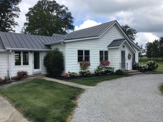 Don't miss this opportunity to experience country living at it's finest! This is a 3-bedroom, 2-bath, 1,876 square foot Country Home that has been completely updated and is ready to enjoy. The updates include a new addition, new roof, siding, wood flooring, air conditioner, heating system, electrical - you name it and it has been updated. Enjoy the beautiful landscaping and wide-open spaces that include mature trees, new plantings and even an apple orchard. House features include a 15x17 family room, 11x15 formal dining room, large bedrooms, parlor, sun room, large deck, laundry room, basement, whole-house generator and more. Outdoors you will find a spacious barn with room for tools, lawn equipment and even animals. There is also approximately 4 1/2 +/- acres for added income potential. This is a wonderful opportunity to create your dream home in the country. Up to 68+/- additional acres available with full frontage on the Mississinewa River. - BEAUTIFUL COUNTRY HOME FOR SALE - 13+/- ACRES IN DELAWARE COUNTY, INDIANA