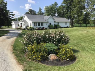Don't miss this opportunity to experience country living at it's finest! This is a 3-bedroom, 2-bath, 1,876 square foot Country Home that has been completely updated and is ready to enjoy. The updates include a new addition, new roof, siding, wood flooring, air conditioner, heating system, electrical - you name it and it has been updated. Enjoy the beautiful landscaping and wide-open spaces that include mature trees, new plantings and even an apple orchard. House features include a 15x17 family room, 11x15 formal dining room, large bedrooms, parlor, sun room, large deck, laundry room, basement, whole-house generator and more. Outdoors you will find a spacious barn with room for tools, lawn equipment and even animals. There is also approximately 4 1/2 +/- acres for added income potential. This is a wonderful opportunity to create your dream home in the country. Up to 68+/- additional acres available with full frontage on the Mississinewa River. - BEAUTIFUL COUNTRY HOME FOR SALE - 13+/- ACRES IN DELAWARE COUNTY, INDIANA