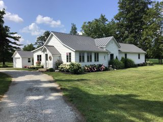 Don't miss this opportunity to experience country living at it's finest! This is a 3-bedroom, 2-bath, 1,876 square foot Country Home that has been completely updated and is ready to enjoy. The updates include a new addition, new roof, siding, wood flooring, air conditioner, heating system, electrical - you name it and it has been updated. Enjoy the beautiful landscaping and wide-open spaces that include mature trees, new plantings and even an apple orchard. House features include a 15x17 family room, 11x15 formal dining room, large bedrooms, parlor, sun room, large deck, laundry room, basement, whole-house generator and more. Outdoors you will find a spacious barn with room for tools, lawn equipment and even animals. There is also approximately 4 1/2 +/- acres for added income potential. This is a wonderful opportunity to create your dream home in the country. Up to 68+/- additional acres available with full frontage on the Mississinewa River. - BEAUTIFUL COUNTRY HOME FOR SALE - 13+/- ACRES IN DELAWARE COUNTY, INDIANA