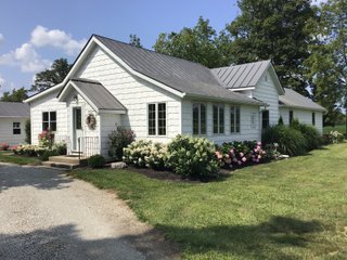 Don't miss this opportunity to experience country living at it's finest! This is a 3-bedroom, 2-bath, 1,876 square foot Country Home that has been completely updated and is ready to enjoy. The updates include a new addition, new roof, siding, wood flooring, air conditioner, heating system, electrical - you name it and it has been updated. Enjoy the beautiful landscaping and wide-open spaces that include mature trees, new plantings and even an apple orchard. House features include a 15x17 family room, 11x15 formal dining room, large bedrooms, parlor, sun room, large deck, laundry room, basement, whole-house generator and more. Outdoors you will find a spacious barn with room for tools, lawn equipment and even animals. There is also approximately 4 1/2 +/- acres for added income potential. This is a wonderful opportunity to create your dream home in the country. Up to 68+/- additional acres available with full frontage on the Mississinewa River. - BEAUTIFUL COUNTRY HOME FOR SALE - 13+/- ACRES IN DELAWARE COUNTY, INDIANA