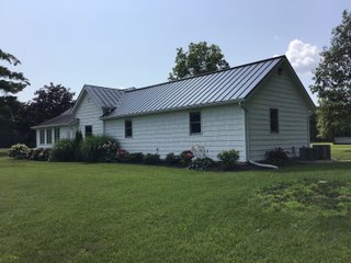 Don't miss this opportunity to experience country living at it's finest! This is a 3-bedroom, 2-bath, 1,876 square foot Country Home that has been completely updated and is ready to enjoy. The updates include a new addition, new roof, siding, wood flooring, air conditioner, heating system, electrical - you name it and it has been updated. Enjoy the beautiful landscaping and wide-open spaces that include mature trees, new plantings and even an apple orchard. House features include a 15x17 family room, 11x15 formal dining room, large bedrooms, parlor, sun room, large deck, laundry room, basement, whole-house generator and more. Outdoors you will find a spacious barn with room for tools, lawn equipment and even animals. There is also approximately 4 1/2 +/- acres for added income potential. This is a wonderful opportunity to create your dream home in the country. Up to 68+/- additional acres available with full frontage on the Mississinewa River. - BEAUTIFUL COUNTRY HOME FOR SALE - 13+/- ACRES IN DELAWARE COUNTY, INDIANA