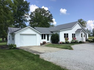 Don't miss this opportunity to experience country living at it's finest! This is a 3-bedroom, 2-bath, 1,876 square foot Country Home that has been completely updated and is ready to enjoy. The updates include a new addition, new roof, siding, wood flooring, air conditioner, heating system, electrical - you name it and it has been updated. Enjoy the beautiful landscaping and wide-open spaces that include mature trees, new plantings and even an apple orchard. House features include a 15x17 family room, 11x15 formal dining room, large bedrooms, parlor, sun room, large deck, laundry room, basement, whole-house generator and more. Outdoors you will find a spacious barn with room for tools, lawn equipment and even animals. There is also approximately 4 1/2 +/- acres for added income potential. This is a wonderful opportunity to create your dream home in the country. Up to 68+/- additional acres available with full frontage on the Mississinewa River. - BEAUTIFUL COUNTRY HOME FOR SALE - 13+/- ACRES IN DELAWARE COUNTY, INDIANA
