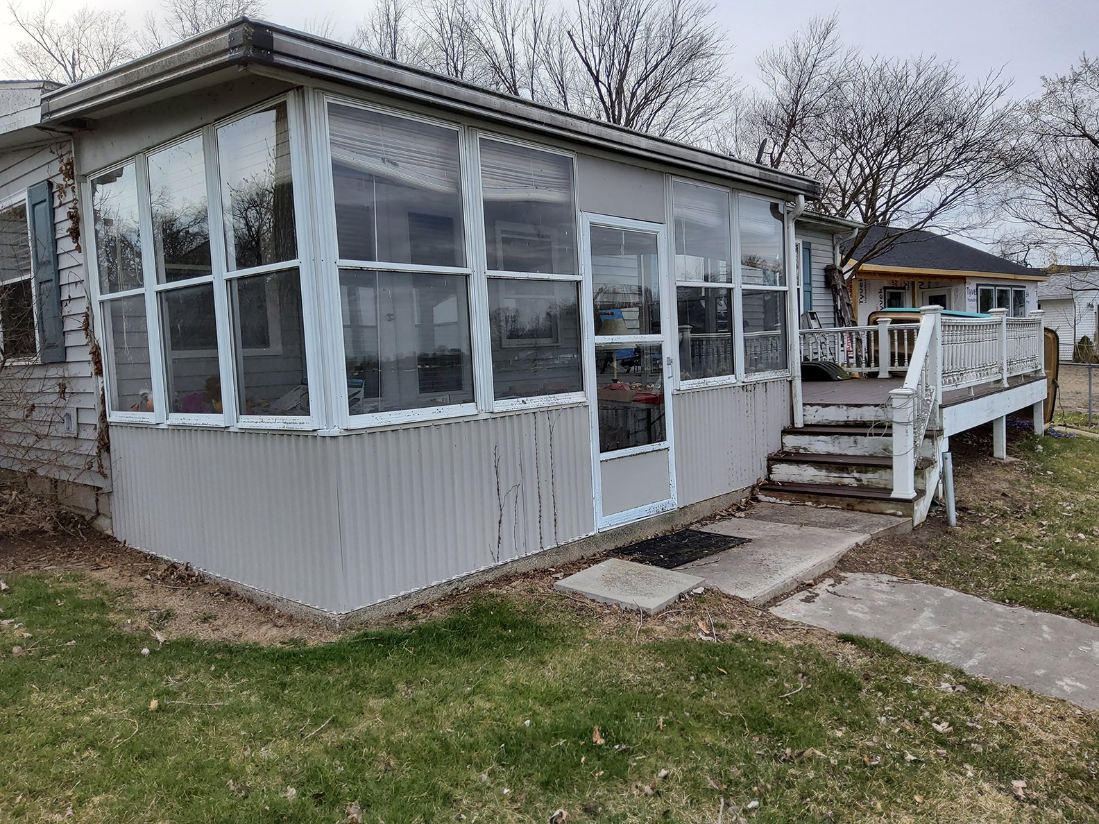Property photo 1 - **SOLD BEFORE AUCTION** TIMED ONLINE ONLY REAL ESTATE AUCTION - LAKE FRONT HOME ON LOON LAKE IN WHITLEY COUNTY, INDIANA