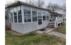 Property photo 1 - **SOLD BEFORE AUCTION** TIMED ONLINE ONLY REAL ESTATE AUCTION - LAKE FRONT HOME ON LOON LAKE IN WHITLEY COUNTY, INDIANA