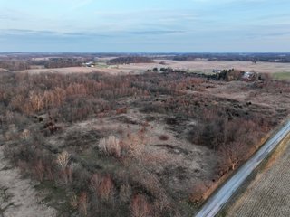 This is 53+/- acres of gently rolling recreational land in Noble County. The property consists of roughly 8+/- acres of timberland with some potential timber opportunities. The rest of the property is in USDA and FSA programs that expire September 31st, 2024. New owner has opportunity to reinstate these programs if applied for before July 31st, 2024, not guaranteed. Property has very good road frontage along S 400 E as well as E 500 S. Would make an excellent home building site or hunting property. Look in! - LAND FOR SALE - 53+/- ACRES IN NOBLE COUNTY, INDIANA