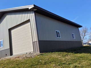 <li>2 Lots
<li> Home
<li> Pole Building
<li> Potential Building Sites

Tri-Lakes Regional Sewer District.<br>
Don't Miss This Opportunity to Buy This Ready to Move in Home!<br>
<b>LOT 1:</b> 1947+/- sq. ft. home & pole building, 3 bedrooms, 1 bath, living room, modern kitchen with appliances, porch & utility room, utilities in the basement, this home is recently remodeled with newer windows, wood flooring & carpet & roofing. New softener & water heater 2023. 33ft x 14ft attached garage. The pole building, 32ft x 40ft built in 2017 has a full bath, partially insulated, epoxy resin floors & two overhead doors & porch. Great for storage or finish for living quarters. Rear waterfront views adjoining the Tri-Lakes Park for your use & enjoyment. The property comes with a portable aluminum pier, the sellers have maintained this pier on Shriner Lake for years, there is no deeded easement to the lake, they have enjoyed use on the lake for years without incidence.<br><br>
<b>LOT 2:</b> Potential building site or extra parking, great location! Possible site for a new home or build a storage building or buy this lot with the home. - REAL ESTATE FOR SALE - HOME IN WHITLEY COUNTY, IN