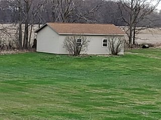  4.73 acres, 2030 +/- Sq. ft finished area and a full walkout basement ready to be finished, with plumbing for an extra bath there is a sink and bathtub to be installed , 2 bedrooms, potential for 3rd bedroom. Large Master bedroom with bath, shower and jetted tub, walk in Closet.  2 & 1/2 baths, living room, kitchen with custom cabinets, appliances, formal dining room,  screened porch, utilities in the basement, newer geothermal heat, Culligan softener &  attached garage. 24ft x 32ft Storage building. Don't miss this opportunity to buy this ready to move in home! - REAL ESTATE FOR SALE - 4.73+/- ACRES IN WHITLEY COUNTY, INDIANA