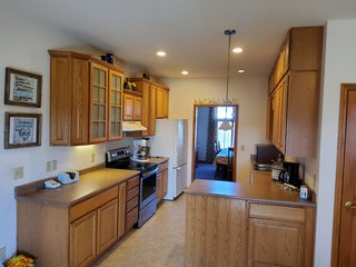  4.73 acres, 2030 +/- Sq. ft finished area and a full walkout basement ready to be finished, with plumbing for an extra bath there is a sink and bathtub to be installed , 2 bedrooms, potential for 3rd bedroom. Large Master bedroom with bath, shower and jetted tub, walk in Closet.  2 & 1/2 baths, living room, kitchen with custom cabinets, appliances, formal dining room,  screened porch, utilities in the basement, newer geothermal heat, Culligan softener &  attached garage. 24ft x 32ft Storage building. Don't miss this opportunity to buy this ready to move in home! - REAL ESTATE FOR SALE - 4.73+/- ACRES IN WHITLEY COUNTY, INDIANA