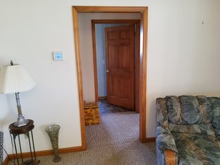  4.73 acres, 2030 +/- Sq. ft finished area and a full walkout basement ready to be finished, with plumbing for an extra bath there is a sink and bathtub to be installed , 2 bedrooms, potential for 3rd bedroom. Large Master bedroom with bath, shower and jetted tub, walk in Closet.  2 & 1/2 baths, living room, kitchen with custom cabinets, appliances, formal dining room,  screened porch, utilities in the basement, newer geothermal heat, Culligan softener &  attached garage. 24ft x 32ft Storage building. Don't miss this opportunity to buy this ready to move in home! - REAL ESTATE FOR SALE - 4.73+/- ACRES IN WHITLEY COUNTY, INDIANA
