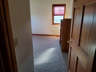  4.73 acres, 2030 +/- Sq. ft finished area and a full walkout basement ready to be finished, with plumbing for an extra bath there is a sink and bathtub to be installed , 2 bedrooms, potential for 3rd bedroom. Large Master bedroom with bath, shower and jetted tub, walk in Closet.  2 & 1/2 baths, living room, kitchen with custom cabinets, appliances, formal dining room,  screened porch, utilities in the basement, newer geothermal heat, Culligan softener &  attached garage. 24ft x 32ft Storage building. Don't miss this opportunity to buy this ready to move in home! - REAL ESTATE FOR SALE - 4.73+/- ACRES IN WHITLEY COUNTY, INDIANA