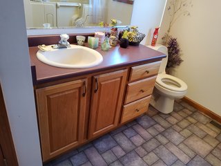  4.73 acres, 2030 +/- Sq. ft finished area and a full walkout basement ready to be finished, with plumbing for an extra bath there is a sink and bathtub to be installed , 2 bedrooms, potential for 3rd bedroom. Large Master bedroom with bath, shower and jetted tub, walk in Closet.  2 & 1/2 baths, living room, kitchen with custom cabinets, appliances, formal dining room,  screened porch, utilities in the basement, newer geothermal heat, Culligan softener &  attached garage. 24ft x 32ft Storage building. Don't miss this opportunity to buy this ready to move in home! - REAL ESTATE FOR SALE - 4.73+/- ACRES IN WHITLEY COUNTY, INDIANA