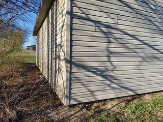  4.73 acres, 2030 +/- Sq. ft finished area and a full walkout basement ready to be finished, with plumbing for an extra bath there is a sink and bathtub to be installed , 2 bedrooms, potential for 3rd bedroom. Large Master bedroom with bath, shower and jetted tub, walk in Closet.  2 & 1/2 baths, living room, kitchen with custom cabinets, appliances, formal dining room,  screened porch, utilities in the basement, newer geothermal heat, Culligan softener &  attached garage. 24ft x 32ft Storage building. Don't miss this opportunity to buy this ready to move in home! - REAL ESTATE FOR SALE - 4.73+/- ACRES IN WHITLEY COUNTY, INDIANA