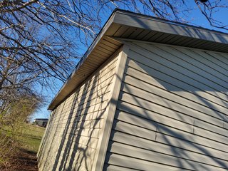  4.73 acres, 2030 +/- Sq. ft finished area and a full walkout basement ready to be finished, with plumbing for an extra bath there is a sink and bathtub to be installed , 2 bedrooms, potential for 3rd bedroom. Large Master bedroom with bath, shower and jetted tub, walk in Closet.  2 & 1/2 baths, living room, kitchen with custom cabinets, appliances, formal dining room,  screened porch, utilities in the basement, newer geothermal heat, Culligan softener &  attached garage. 24ft x 32ft Storage building. Don't miss this opportunity to buy this ready to move in home! - REAL ESTATE FOR SALE - 4.73+/- ACRES IN WHITLEY COUNTY, INDIANA