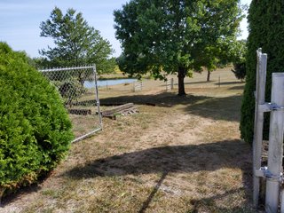 Beautiful country home. 2,692+/- finished sq. ft. home or a total of  3,588+/- sq. ft., 2 pole buildings 40'x75' & 50'x50' w/ interconnecting corridor, both heated & insulated. One has been used as a shop/storage/commercially & has water & rest room. The other has multi-uses w/ tile flooring, full bath & kitchenette great for get-togethers, auto storage & many other uses & a 32'x40' pole building w/ gravel floor great for horses & livestock or extra storage, an additional separate 2 car garage. The home has had many updates most noticeably a totally remodeled master suite, flooring throughout the home, a second main floor bedroom w/ walkout deck & patio, there is a 3rd bedroom, upstairs & large landing w/ room for an extra bed. One & a half baths, large living room, sliding door to deck & patio. Eat in kitchen w/ appliances, a separate dining area. Central air & heat pump. Shady rear patio & deck. The basement is partially finished. There are many updates & amenities too numerous to mention & must be seen in person. A great property for storage, business, hobbies and/or livestock. Stocked fish pond, pasture & potential building site. Come & investigate the potential. - REAL ESTATE FOR SALE - 10.2+/- ACRES IN WHITLEY COUNTY INDIANA
