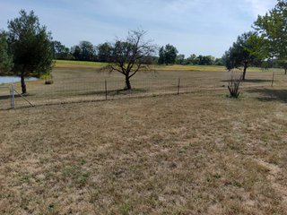 Beautiful country home. 2,692+/- finished sq. ft. home or a total of  3,588+/- sq. ft., 2 pole buildings 40'x75' & 50'x50' w/ interconnecting corridor, both heated & insulated. One has been used as a shop/storage/commercially & has water & rest room. The other has multi-uses w/ tile flooring, full bath & kitchenette great for get-togethers, auto storage & many other uses & a 32'x40' pole building w/ gravel floor great for horses & livestock or extra storage, an additional separate 2 car garage. The home has had many updates most noticeably a totally remodeled master suite, flooring throughout the home, a second main floor bedroom w/ walkout deck & patio, there is a 3rd bedroom, upstairs & large landing w/ room for an extra bed. One & a half baths, large living room, sliding door to deck & patio. Eat in kitchen w/ appliances, a separate dining area. Central air & heat pump. Shady rear patio & deck. The basement is partially finished. There are many updates & amenities too numerous to mention & must be seen in person. A great property for storage, business, hobbies and/or livestock. Stocked fish pond, pasture & potential building site. Come & investigate the potential. - REAL ESTATE FOR SALE - 10.2+/- ACRES IN WHITLEY COUNTY INDIANA