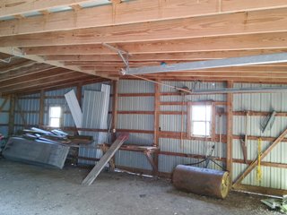 Beautiful country home. 2,692+/- finished sq. ft. home or a total of  3,588+/- sq. ft., 2 pole buildings 40'x75' & 50'x50' w/ interconnecting corridor, both heated & insulated. One has been used as a shop/storage/commercially & has water & rest room. The other has multi-uses w/ tile flooring, full bath & kitchenette great for get-togethers, auto storage & many other uses & a 32'x40' pole building w/ gravel floor great for horses & livestock or extra storage, an additional separate 2 car garage. The home has had many updates most noticeably a totally remodeled master suite, flooring throughout the home, a second main floor bedroom w/ walkout deck & patio, there is a 3rd bedroom, upstairs & large landing w/ room for an extra bed. One & a half baths, large living room, sliding door to deck & patio. Eat in kitchen w/ appliances, a separate dining area. Central air & heat pump. Shady rear patio & deck. The basement is partially finished. There are many updates & amenities too numerous to mention & must be seen in person. A great property for storage, business, hobbies and/or livestock. Stocked fish pond, pasture & potential building site. Come & investigate the potential. - REAL ESTATE FOR SALE - 10.2+/- ACRES IN WHITLEY COUNTY INDIANA